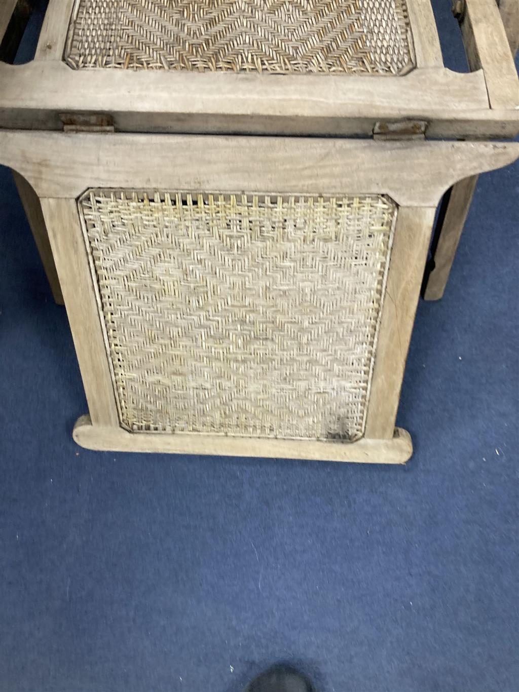 An Anglo Indian caned bleached hardwood steamer chair